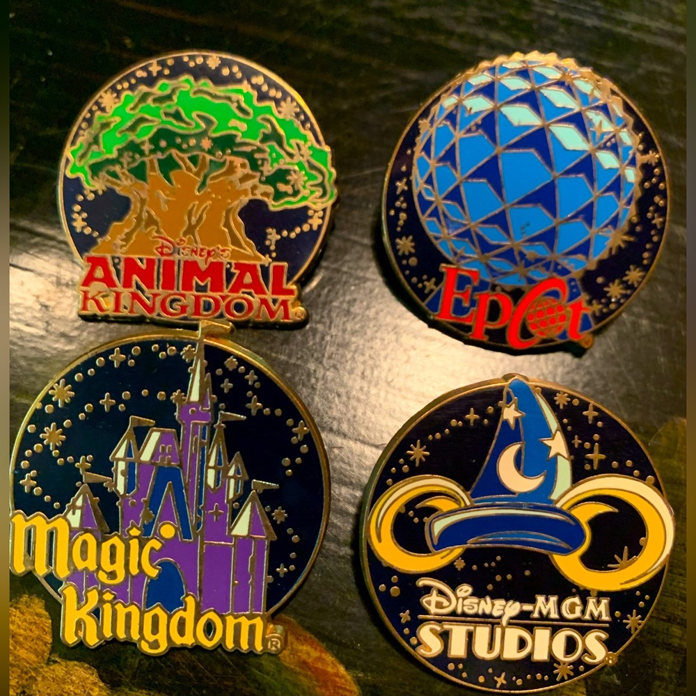 Lot of 4 Disney parks collectible Pins, used